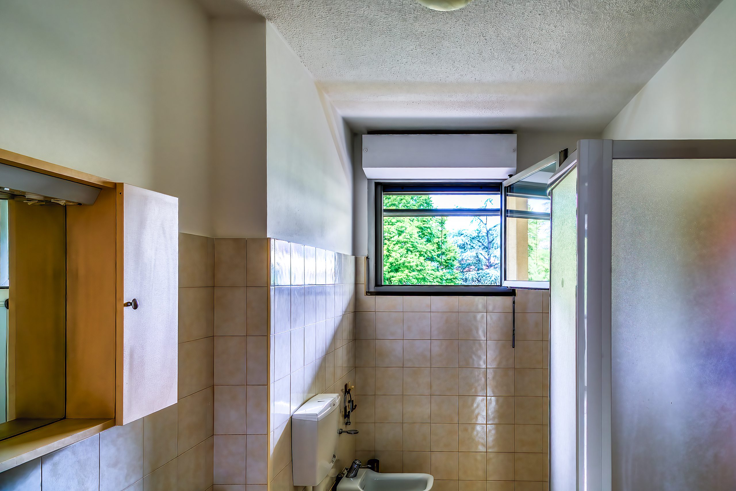 Il bagno finestrato con vista sul Parco del Tricolore